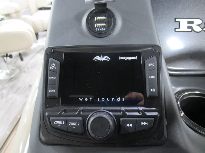 Slide: The Image of 2025 Ranger 223 FC boat console with Wet Sounds audio system and USB port. - 9
