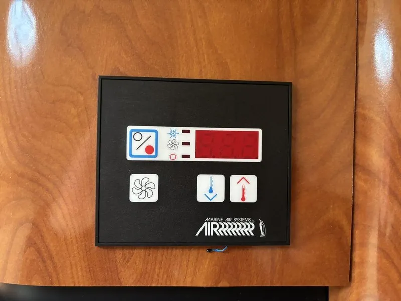 Slide: The Image of Control panel for marine air systems on a 2008 Fountain 33 Sportfish Cruiser. - 20