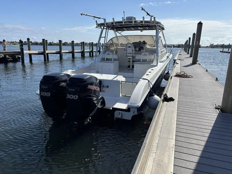 Slide: The Image of 2008 Fountain 33 Sportfish Cruiser docked with twin Mercury 300 engines. - 5
