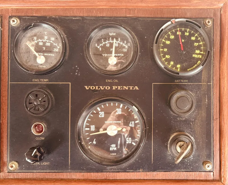 Slide: The Image of Vintage 1980 C & L Sea Ranger boat dashboard with Volvo Penta gauges and controls. - 20