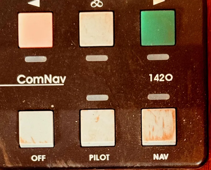 Slide: The Image of Control panel of a 1980 C & L Sea Ranger, featuring ComNav 1420 navigation system. - 25