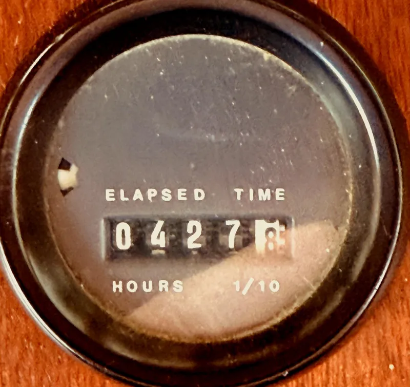 Slide: The Image of Elapsed time meter showing 427.8 hours on 1980 C & L Sea Ranger. - 28