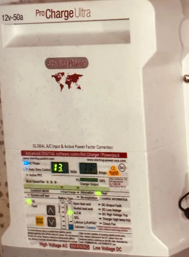 Slide: The Image of Sterling Power ProCharge Ultra battery charger, 12V-50A, mounted on a C & L Sea Ranger 1980. - 39