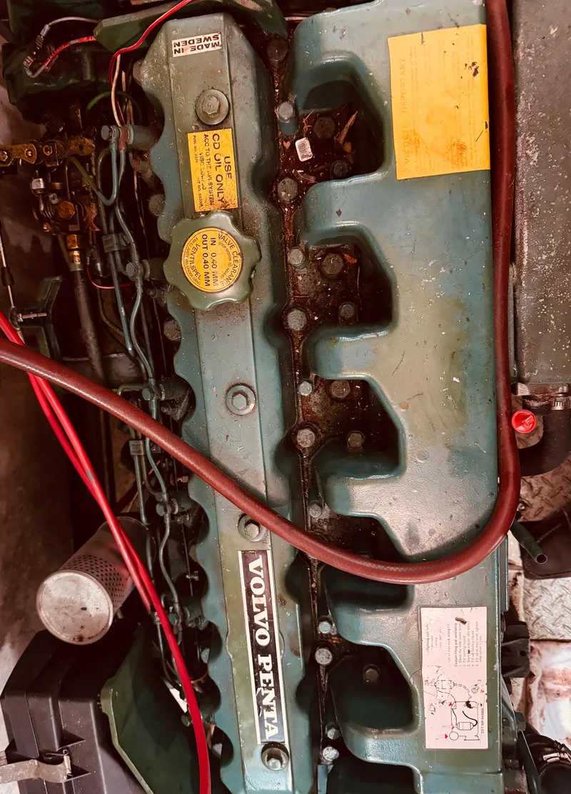 Slide: The Image of Engine of 1980 C & L Sea Ranger boat, featuring Volvo Penta components. - 41