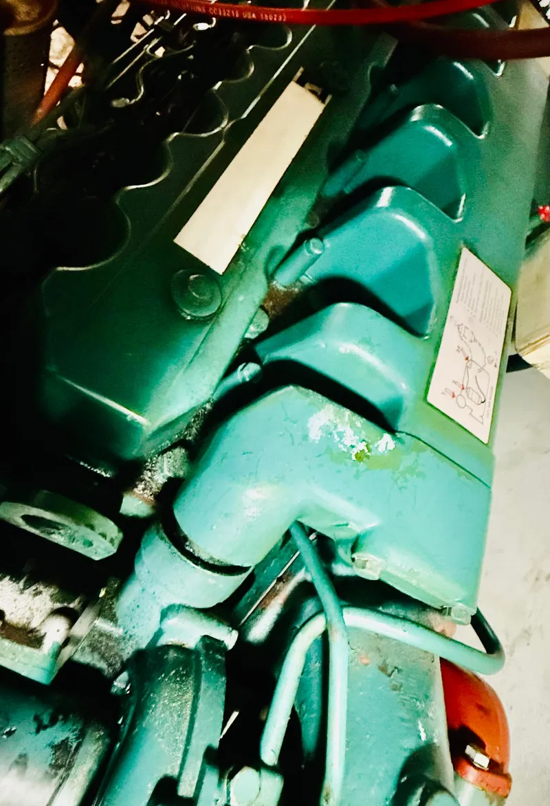 Slide: The Image of Close-up of a 1980 C & L Sea Ranger engine, showcasing its intricate mechanical components. - 42