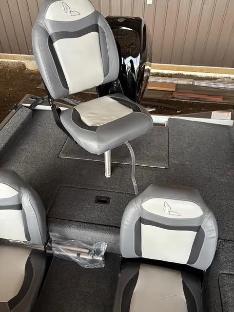 Slide: The Image of 2025 Lowe Skorpion 16 boat interior with gray and white seating. - 14