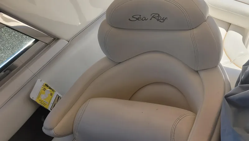 Slide: The Image of Luxurious seating on a 1998 Sea Ray 450 Sundancer yacht, featuring elegant design and comfort. - 33