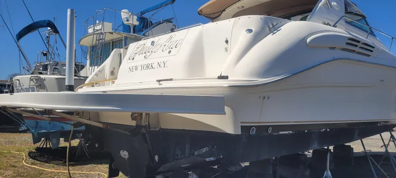 Slide: The Image of 1998 Sea Ray 450 Sundancer yacht on dry dock, New York, NY. - 5