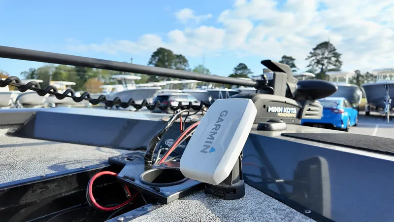 Slide: The Image of 2021 G3 Sportsman 1610 boat with Garmin and Minn Kota equipment, parked outdoors. - 5