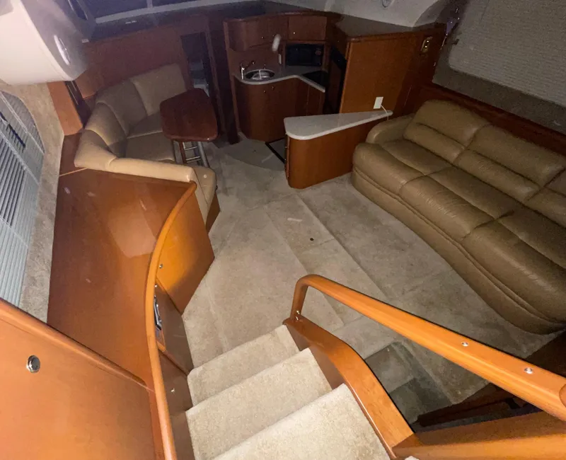 Slide: The Image of Interior of 2005 Silverton 35 Motor Yacht with seating and kitchenette. - 24