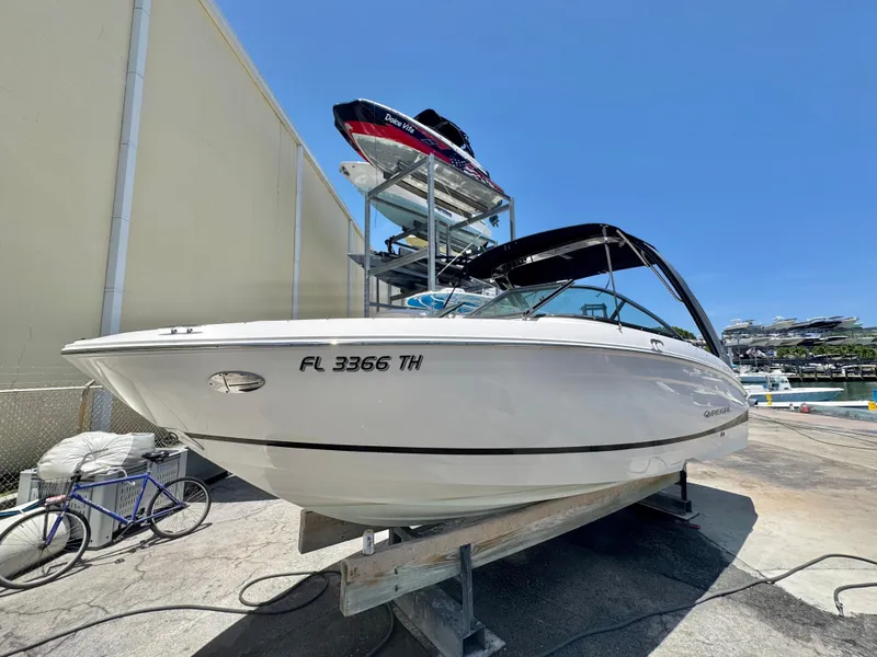 The Image of 2020 Regal LS4 boat on dry dock, sunny day, marina background. - 0
