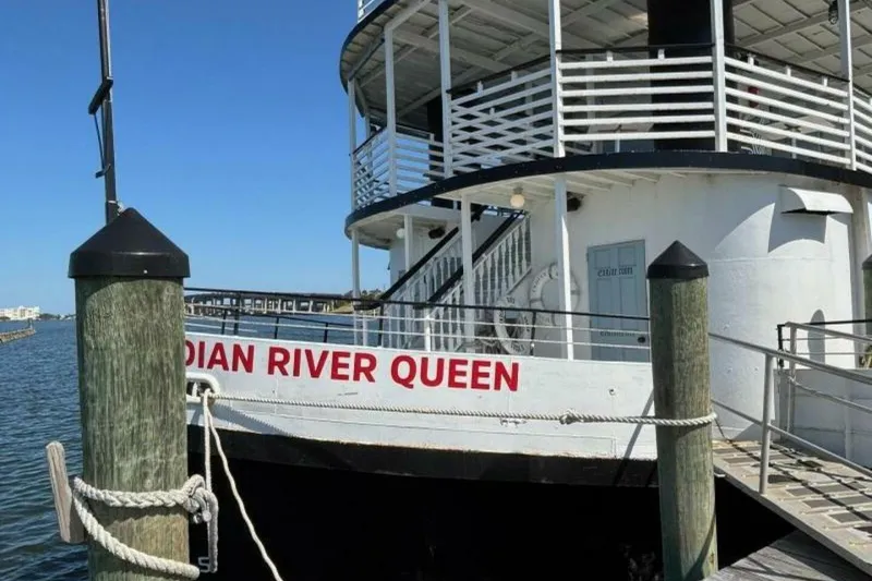Slide: The Image of Custom 1984 paddle wheel boat "Indian River Queen" docked at a pier. - 10