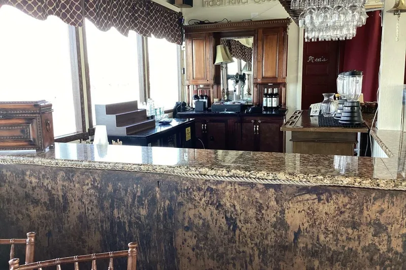 Slide: The Image of Luxurious vintage bar interior with wooden cabinets and granite countertop, Custom Paddle Wheel, 1984. - 23