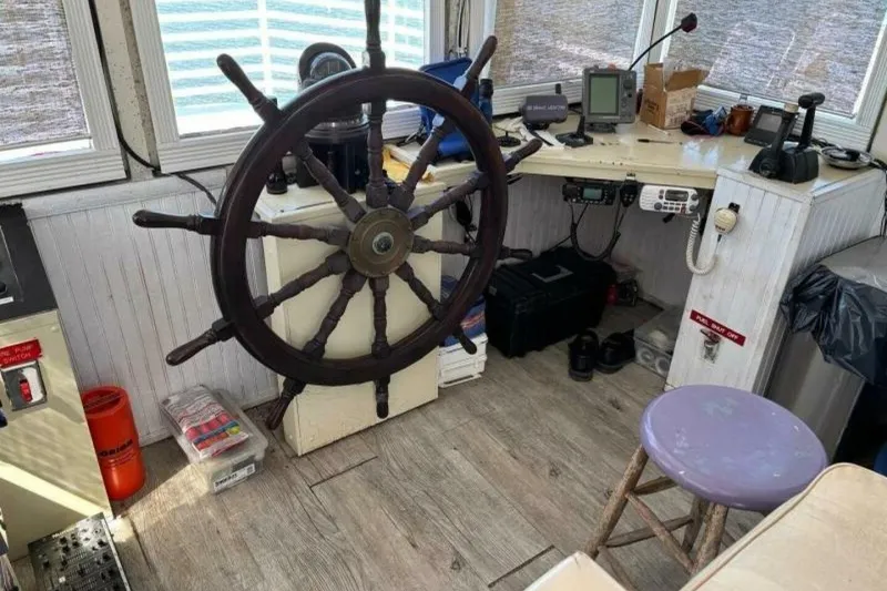 Slide: The Image of Vintage 1984 custom paddle wheel boat helm with wooden steering wheel and navigation equipment. - 42