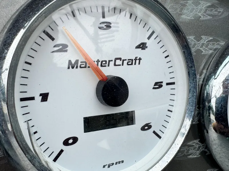 Slide: The Image of Close-up of a 2001 MasterCraft X-Star RPM gauge displaying engine speed. - 10