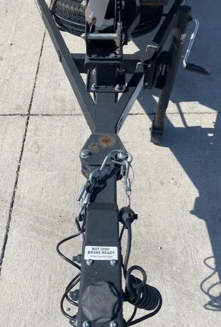 Slide: The Image of Trailer hitch of 2024 Tracker Bass Tracker Classic XL on concrete surface. - 20