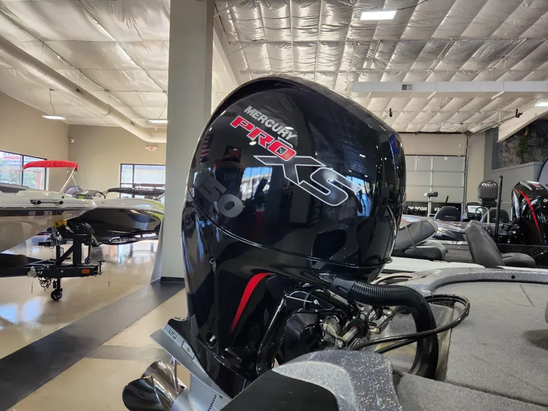 Slide: The Image of 2025 Nitro Z18 boat with Mercury Pro XS engine in showroom. - 3