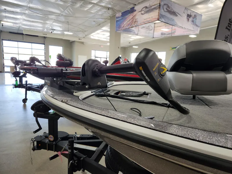 Slide: The Image of 2025 Nitro Z18 boat in showroom, featuring sleek design and advanced motor technology. - 5