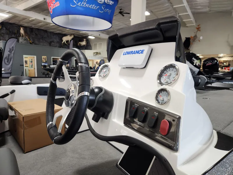 Slide: The Image of Steering console of a 2025 Nitro Z18 boat with gauges and Lowrance electronics. - 7