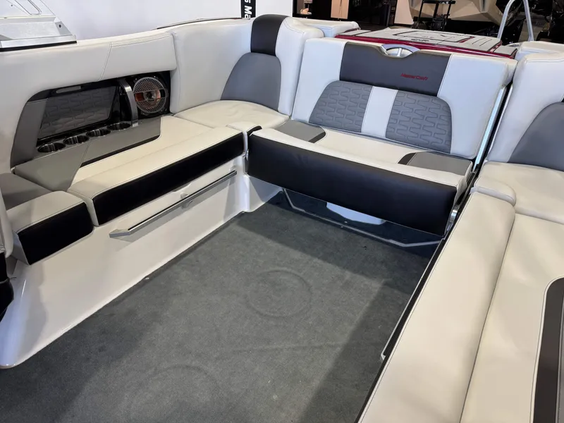 Slide: The Image of 2019 MasterCraft X22 boat interior with sleek seating and modern design. - 15