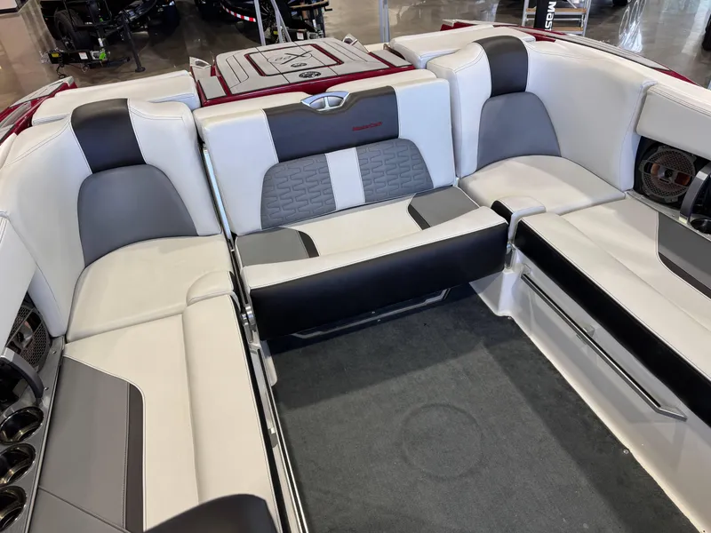 Slide: The Image of 2019 MasterCraft X22 boat interior with luxurious seating and modern design. - 16