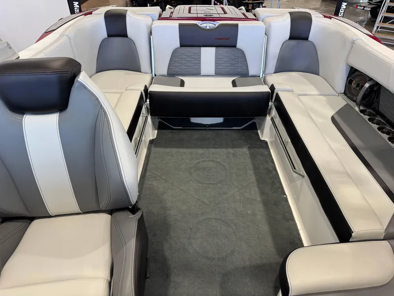 Slide: The Image of 2019 MasterCraft X22 boat interior with luxurious seating and modern design. - 21