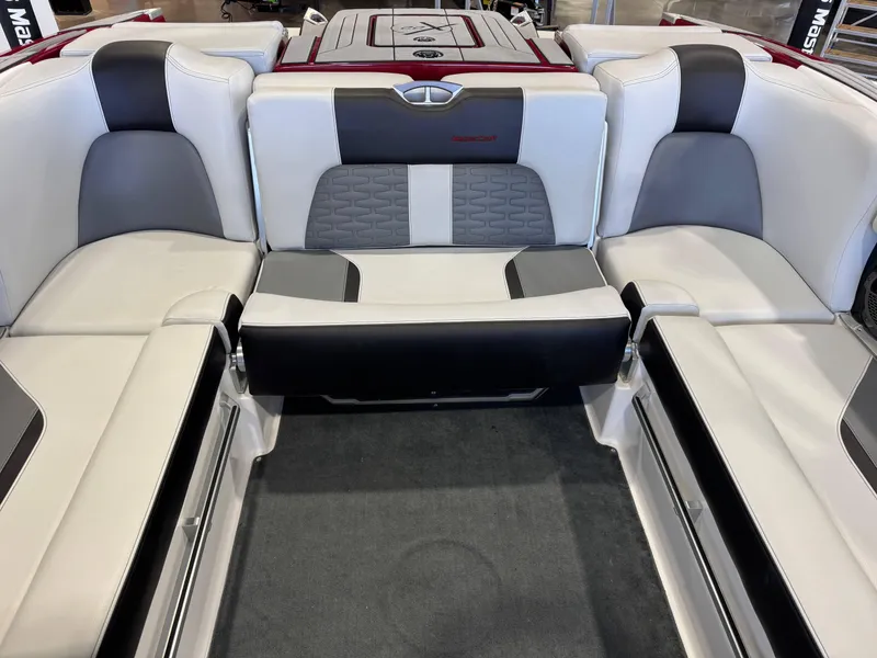 Slide: The Image of 2019 MasterCraft X22 boat interior with luxurious seating and modern design. - 26