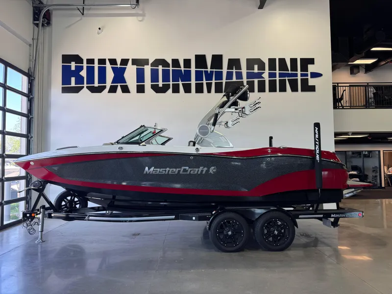 Slide: The Image of 2019 MasterCraft X22 boat displayed at Buxton Marine showroom. - 4