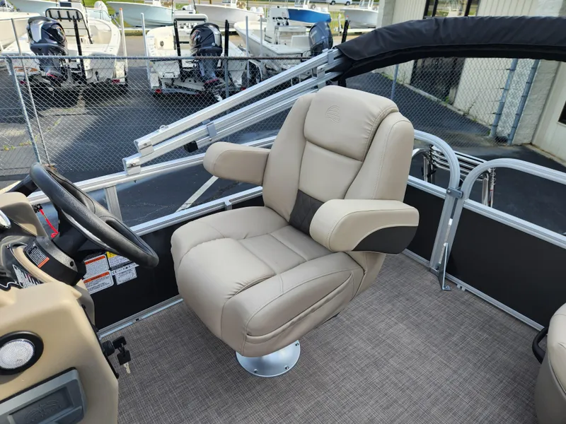 Slide: The Image of Luxurious seating on 2025 Sun Tracker Party Barge 16 DLX pontoon boat. - 9