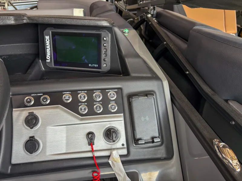 Slide: The Image of Control panel of 2025 Trifecta 23 RF SS boat with Lowrance Elite display. - 11