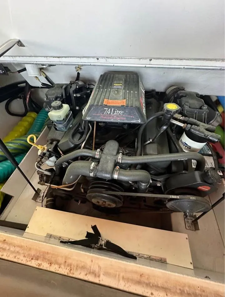 Slide: The Image of 1997 Cobalt 220 engine compartment with 7.4L engine, detailed view. - 10