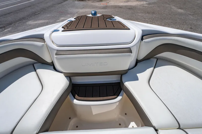 Slide: The Image of Interior view of 2015 Yamaha Boats 242 Limited S, featuring sleek white seating. - 8