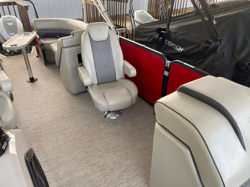 Slide: The Image of 2021 Premier 230 Solaris RF boat interior with plush seating and modern design. - 7