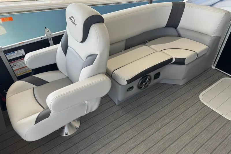 Slide: The Image of Luxurious seating on 2025 SunCatcher Select 20RC boat with plush upholstery and modern design. - 6
