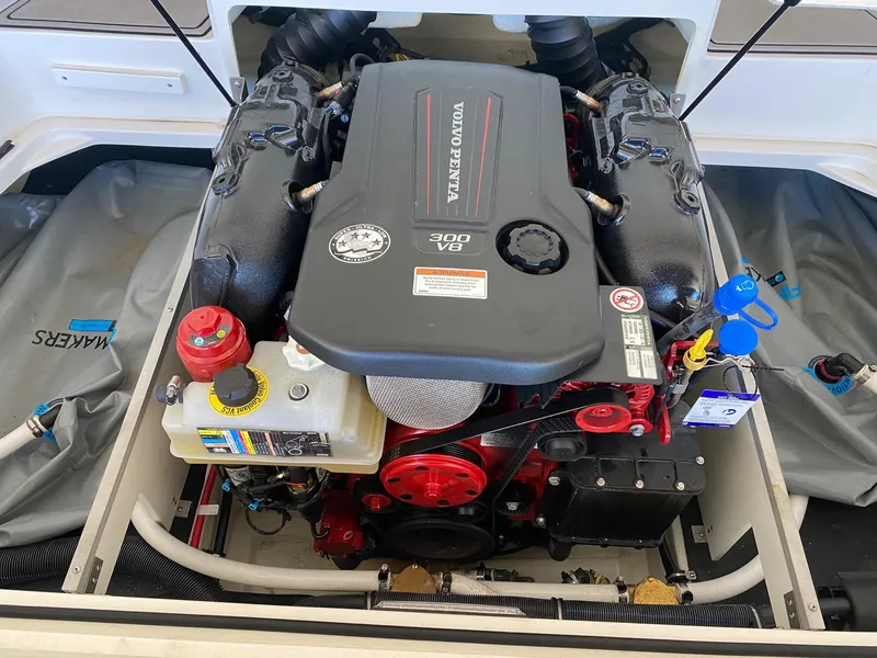 Slide: The Image of 2022 Cobalt CS23 Surf boat engine, featuring a Volvo Penta 300 V8. - 10