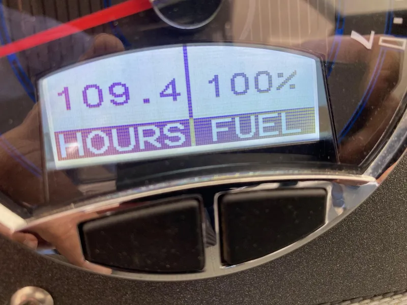 Slide: The Image of Dashboard of a 2022 Cobalt CS23 Surf showing 109.4 hours and full fuel. - 11