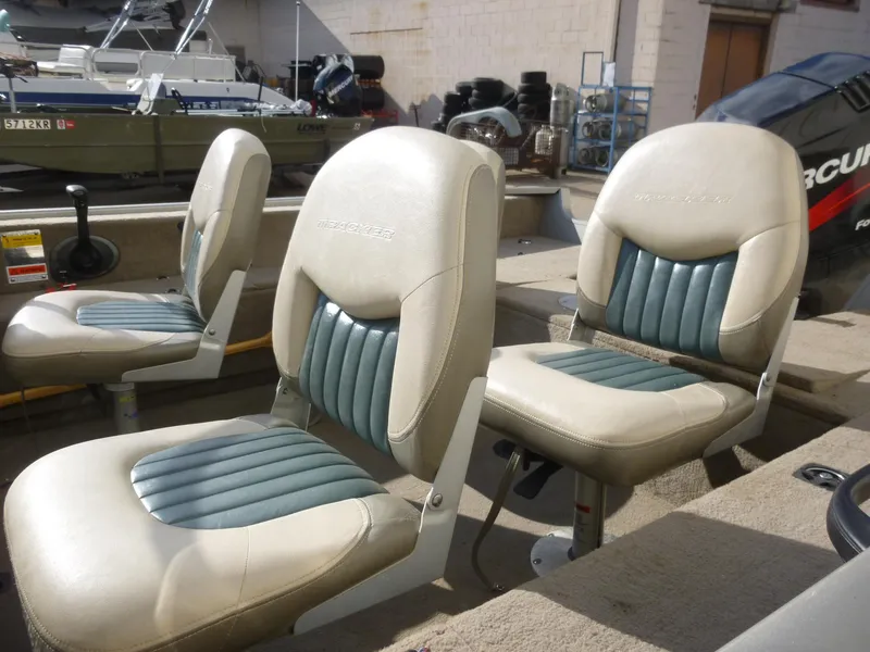 Slide: The Image of 2004 Bass Tracker Targa 16 WT boat seats, featuring cushioned design and durable materials. - 18