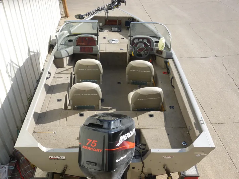 Slide: The Image of 2004 Bass Tracker Targa 16 WT boat with Mercury 75 engine, interior view. - 2