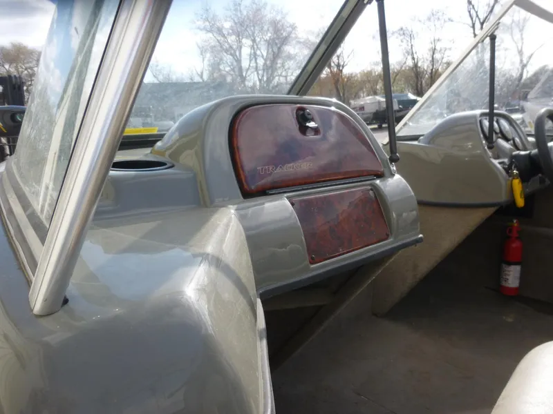 Slide: The Image of 2004 Bass Tracker Targa 16 WT boat interior with windshield and dashboard. - 20