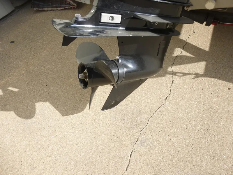Slide: The Image of 2004 Bass Tracker Targa 16 WT boat motor propeller on concrete surface. - 22