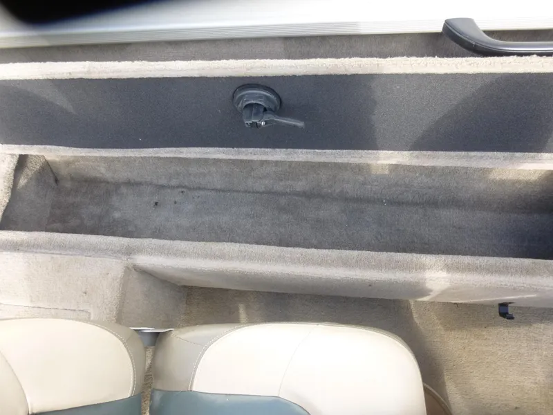 Slide: The Image of Interior view of a 2004 Bass Tracker Targa 16 WT boat storage compartment. - 25
