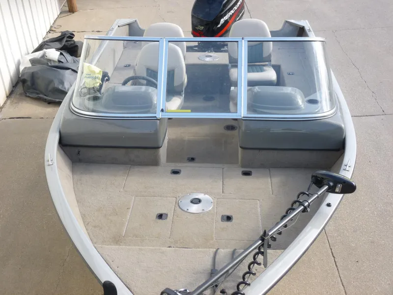 Slide: The Image of 2004 Bass Tracker Targa 16 WT fishing boat with dual consoles and trolling motor. - 9