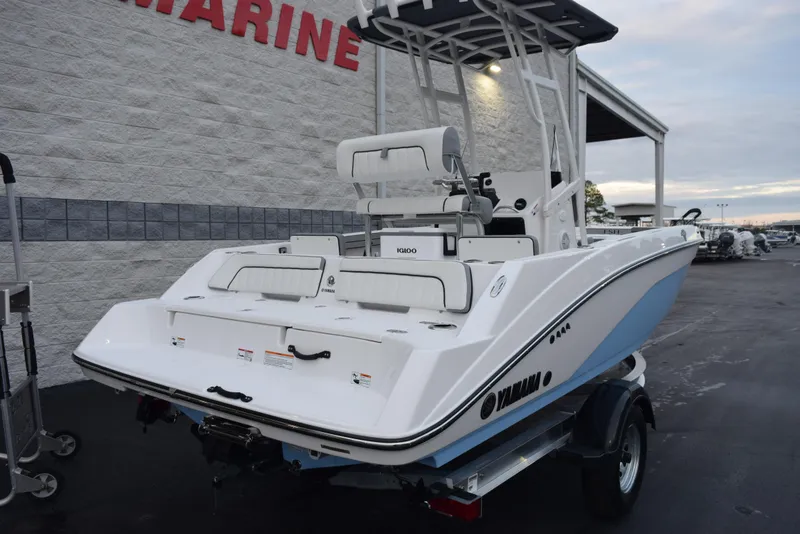 Slide: The Image of 2025 Yamaha Boats 195 FSH Sport on trailer, displayed outdoors. - 4