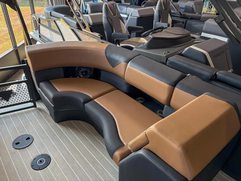 Slide: The Image of Luxurious seating on 2025 Trifecta 23 RF SS boat with brown and black upholstery. - 10