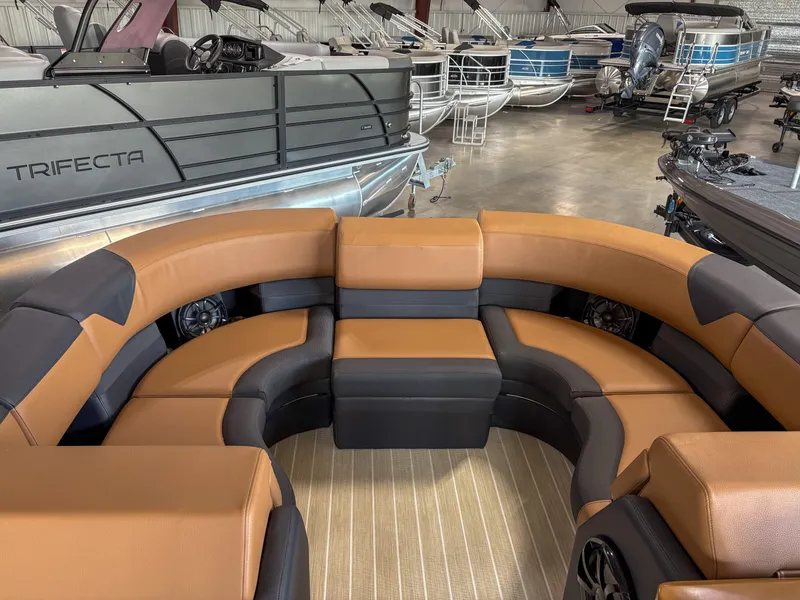 Slide: The Image of Luxurious seating on 2025 Trifecta 23 RF SS pontoon boat in showroom. - 4