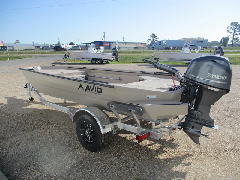 Slide: The Image of 2025 Avid 18 Commander boat with Yamaha motor on a trailer. - 5