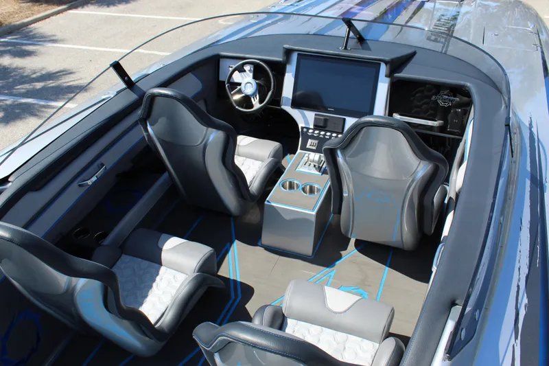 Slide: The Image of Interior of 2025 Fountain 34 Thundercat boat with modern seating and dashboard. - 11