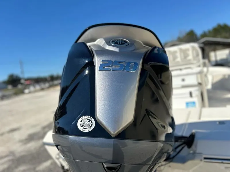 Slide: The Image of 2024 Skeeter SX230 boat with a powerful 250 horsepower engine. - 5