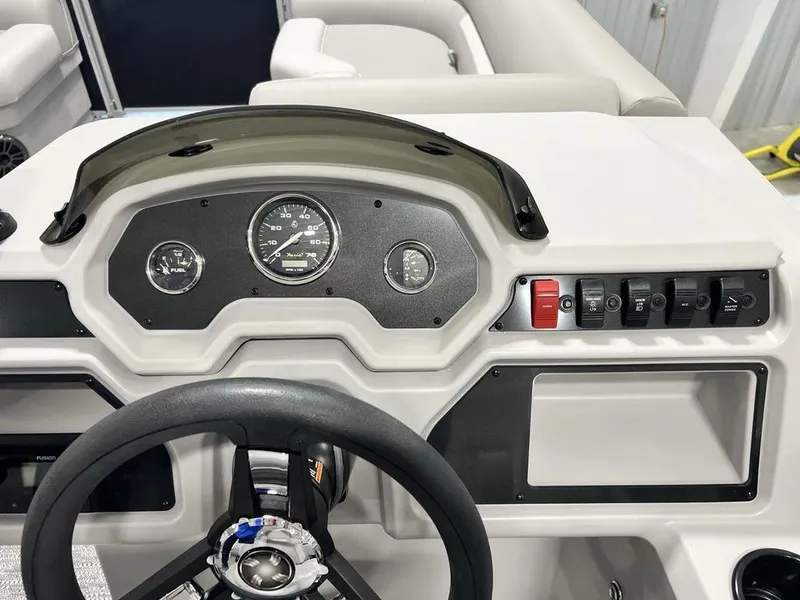 Slide: The Image of 2025 Godfrey Xperience 2086 CX dashboard with steering wheel and control panel. - 12