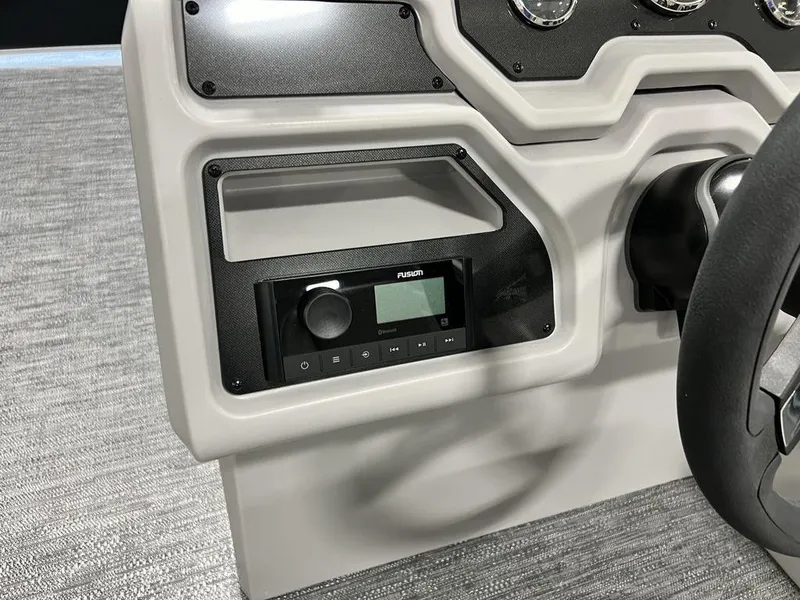 Slide: The Image of Control panel of 2025 Godfrey Xperience 2086 CX boat with Fusion audio system. - 13